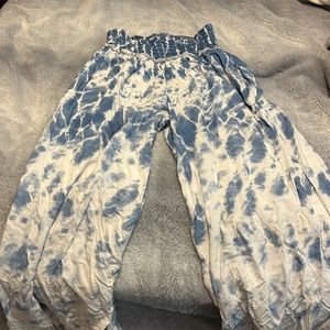 Beautiful white and blue flare pants. Never worn. Purchased a few months ago!